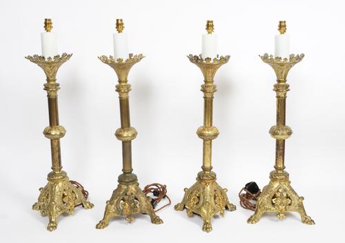 A SET OF FOUR GILT-METAL GOTHIC REVIVAL TABLE LAMPS (4)