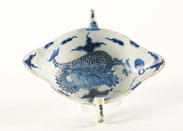 A BOW BLUE AND WHITE TWO-HANDLED SAUCEBOAT