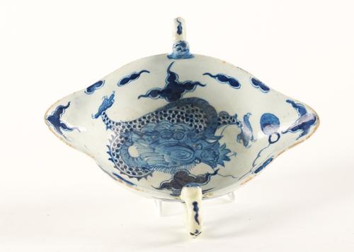 A BOW BLUE AND WHITE TWO-HANDLED SAUCEBOAT