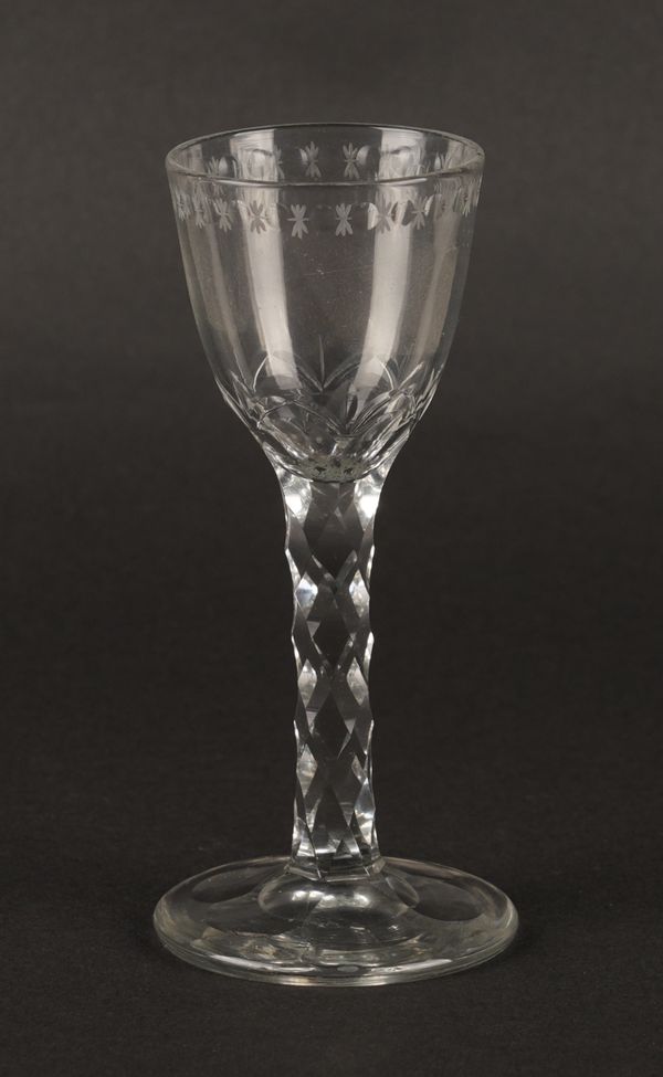 A FACET STEMMED WINE GLASS