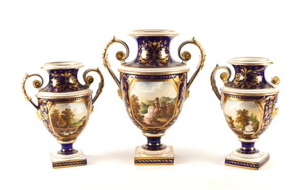 A GARNITURE OF THREE BLOOR DERBY CAMPANA SHAPED TWO-HANDLED VASES (3)