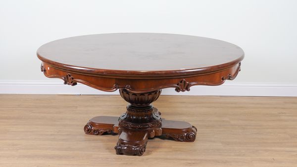 A MODERN FRENCH MAHOGANY CIRCULAR  DINING TABLE