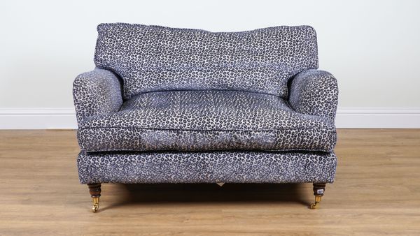 A MODERN TWO SEAT SOFA