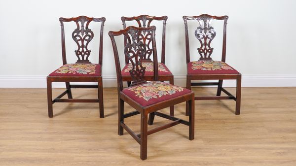 A SET OF FOUR GEORGE III MAHOGANY DINING CHAIRS (4)