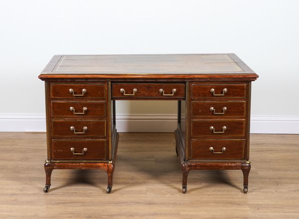 A 19TH CENTURY FRENCH BRASS INLAID MAHOGANY NINE DRAWER WRITING DESK