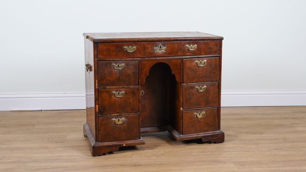 AN 18TH CENTURY WALNUT KNEEHOLE WRITING DESK