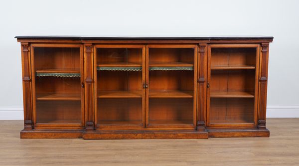 A VICTORIAN SLATE TOPPED OAK BREAKFRONT BOOKCASE