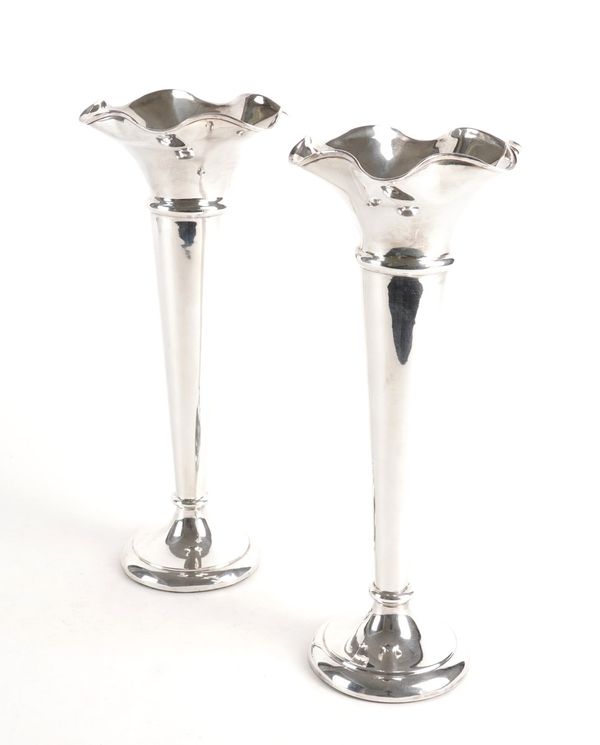 A PAIR OF SILVER TRUMPET SHAPED VASES