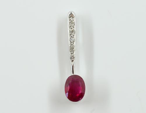 A WHITE GOLD, RUBY AND DIAMOND PENDANT