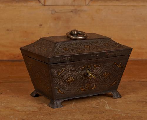 A SPANISH TOLEDOWARE  GILT-METAL INLAID STEEL SARCOPHAGUS SHAPED CASKET