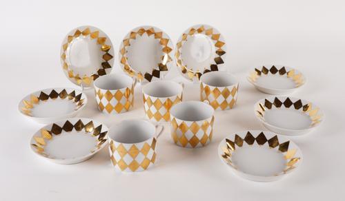 FIVE FORNASETTI `ROMBI' COFFEE CUPS AND EIGHT SAUCERS