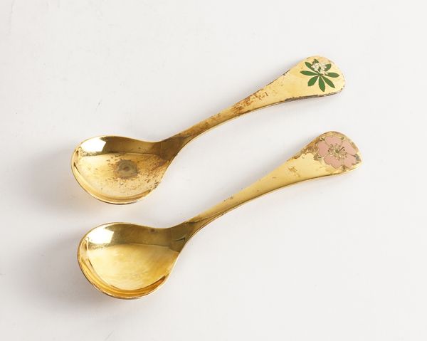 TWO GEORG JENSEN SILVER GILT AND ENAMELLED FLORAL SPOONS (2)