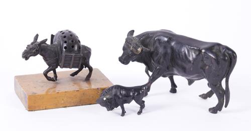 A BRONZE VESTA MODELLED AS A DONKEY TOGETHER WITH TWO BULLS (3)