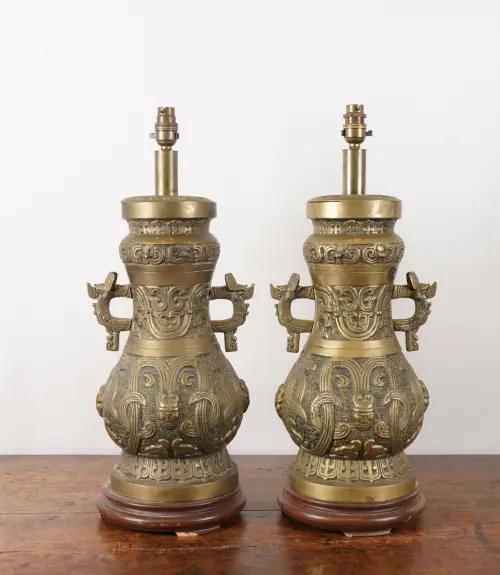 A PAIR OF CHINESE ARCHAIC STYLE METAL VASE TABLE LAMPS (2)