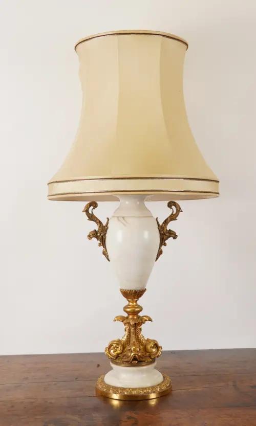 A GILT-METAL MOUNTED WHITE MARBLE BALUSTER TABLE LAMP AND A CHINESE SANG DE BOEUF BALUSTER TABLE LAMP (2)