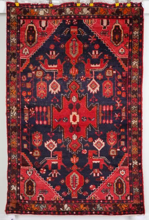 A BELUCHISTAN RUG AND A HAMADAN RUG, PERSIAN WITH A PAKISTAN BOKHARA RUNNER (3)