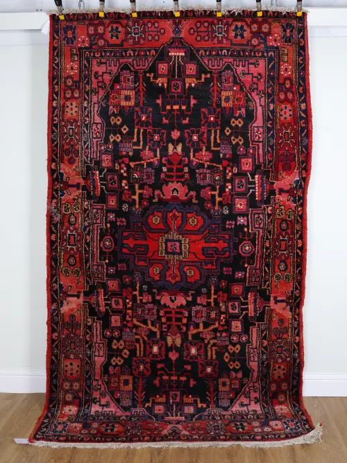 AN INDIAN RUG OF SARABAND DESIGN AND A PERSIAN BAKTHIARI RUG (2)