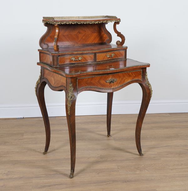 AN EARLY 20TH CENTURY FRENCH GILT-METAL MOUNTED KINGWOOD AND TULIPWOOD BUREAU DE DAME