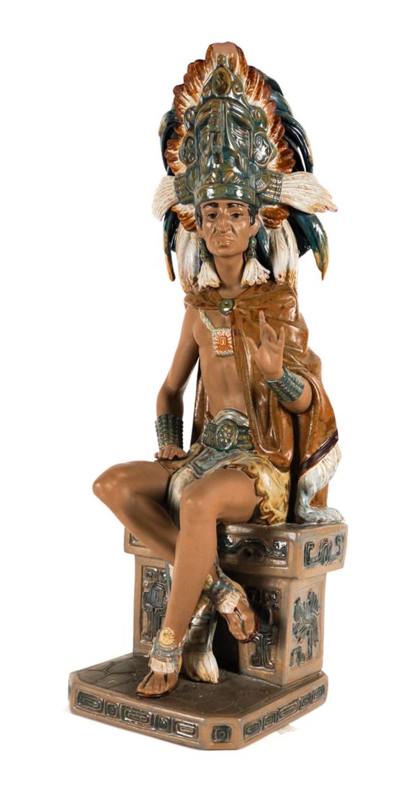 A LLADRO PORCELAIN FIGURE OF AN AZTEC INDIAN