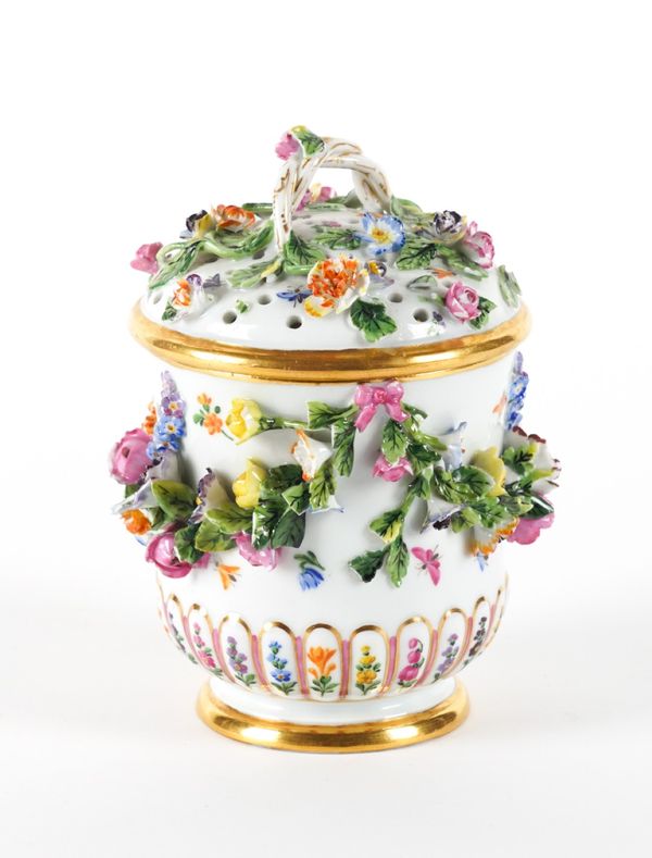 A MEISSEN FLOWER ENCRUSTED CUP AND PIERCED COVER