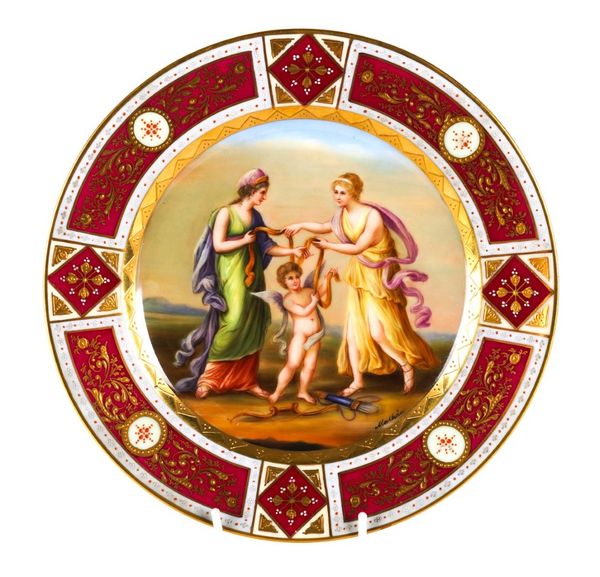 A VIENNA-STYLE PORCELAIN PLATE, `GRAZIEN U. AMOR'