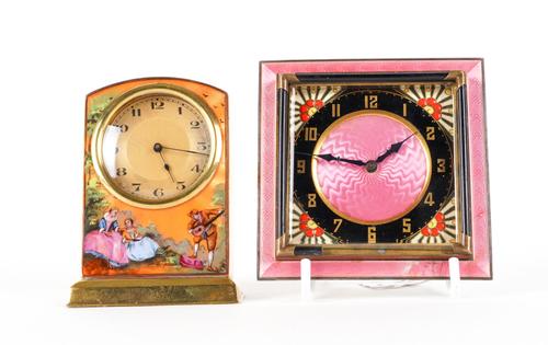 A SWISS PINK GUILLOCHE ENAMEL STRUT CLOCK AND A SILVER-GILT AND ENAMEL DECORATED TIMEPIECE (2)
