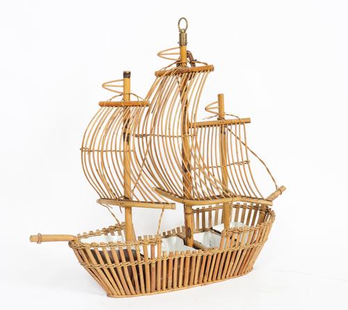 A BAMBOO AND CANE HANGING LIGHT MODELLED AS A SHIP