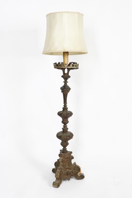 AN ITALIAN EMBOSSED AND SILVERED METAL FLOOR STANDING LAMP