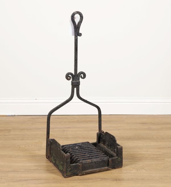 AN EARLY 20TH CENTURY WROUGHT IRON BOOTSCRAPER