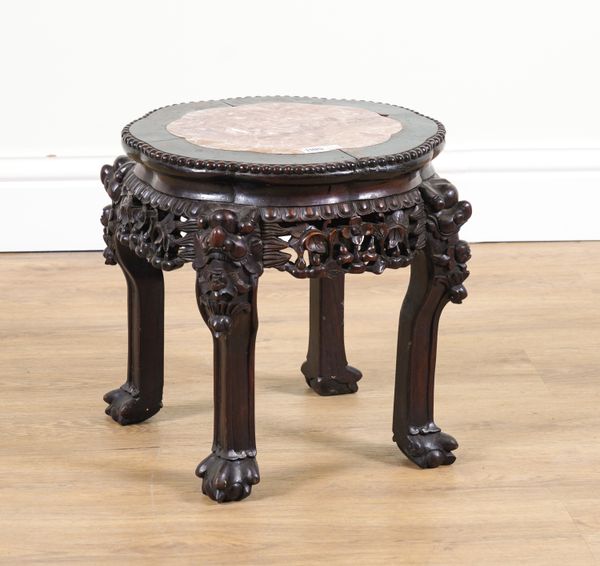 A CHINESE-EXPORT HARDWOOD AND MARBLE INSET URN STAND