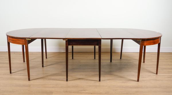 A GEORGE III INLAID MAHOGANY D-END EXTENDING DINING TABLE