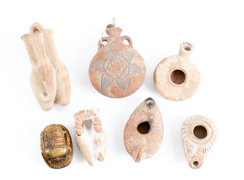 THREE TERRACOTTA OIL LAMPS AND THREE OTHER VESSELS (7)