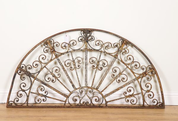 A 19TH CENTURY WROUGHT IRON LUNETTE WINDOW