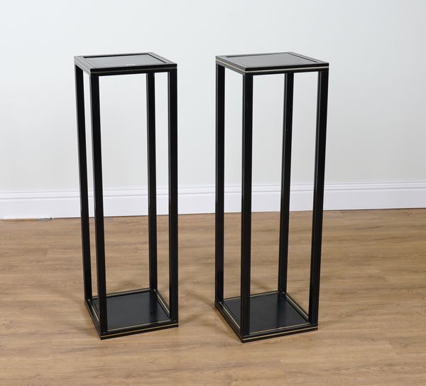 PIERRE VANDEL PARIS; A PAIR OF BRASS INLAID SQUARE BLACK METAL AND SMOKED GLASS PEDESTALS (2)