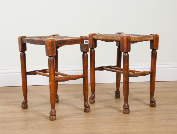 A PAIR OF 19TH CENTURY ASH FRAMED RUSH SEAT STOOLS (2)