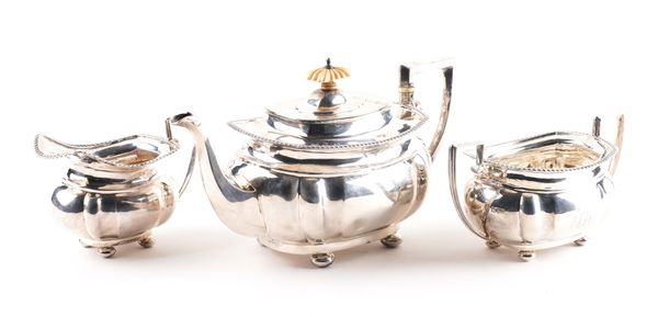 A SILVER THREE PIECE TEA SET