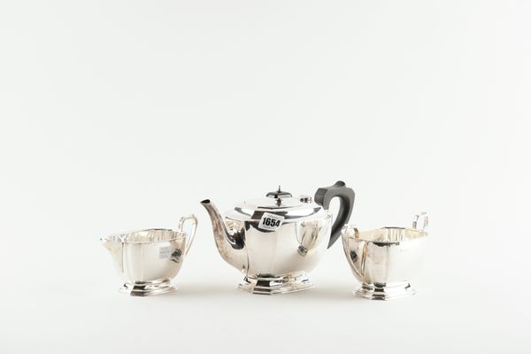 A SILVER THREE PIECE TEA SET