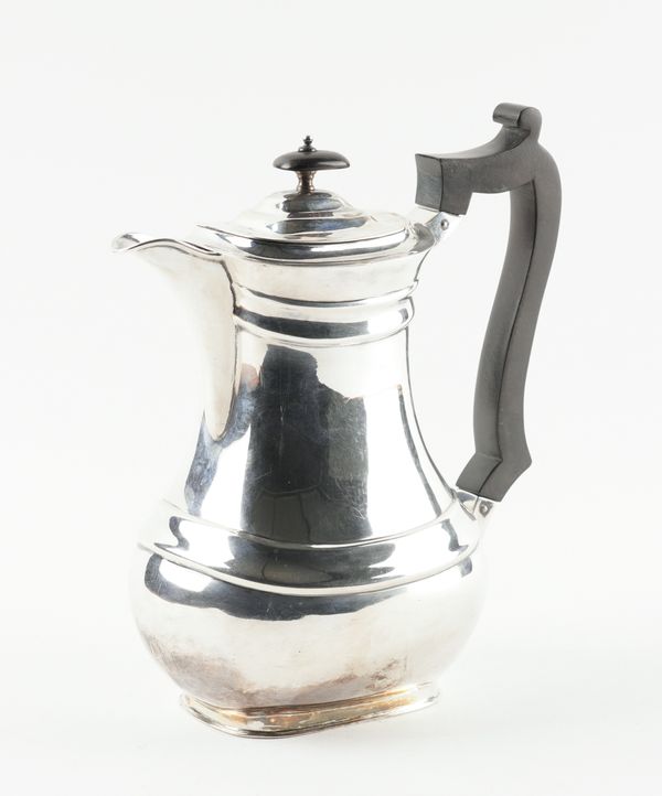 A SILVER HOT WATER JUG