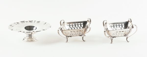 A PAIR OF SILVER TWIN HANDLED BONBON DISHES AND A SILVER SHAPED CIRCULAR BONBON DISH (3)