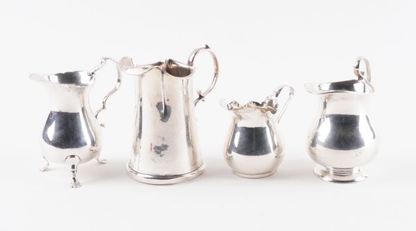 A GROUP OF FOUR SILVER CREAM JUGS (4)