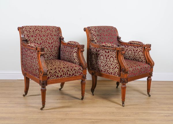 A PAIR OF REGENCY STYLE MAHOGANY LIBRARY CHAIRS (2)