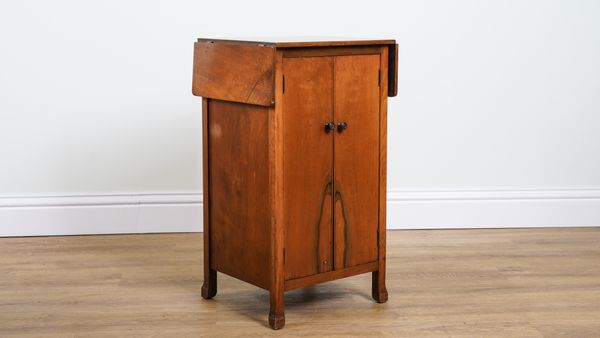 WOLFE & HOLLANDER LTD LONDON; A MID-20TH CENTURY WALNUT DROP FLAP SIDE CUPBOARD