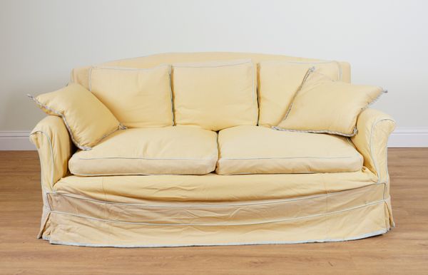 HOWARD & SON; AN EARLY 20TH CENTURY THREE SEATER SOFA