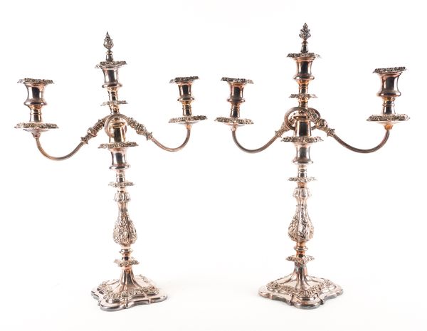 A PAIR OF PLATED THREE LIGHT TABLE CANDELABRA