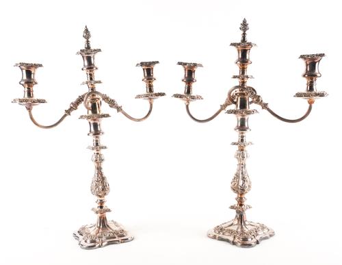 A PAIR OF PLATED THREE LIGHT TABLE CANDELABRA
