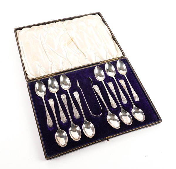 A SET OF TWELVE SILVER TEASPOONS WITH A MATCHING PAIR OF SUGAR TONGS