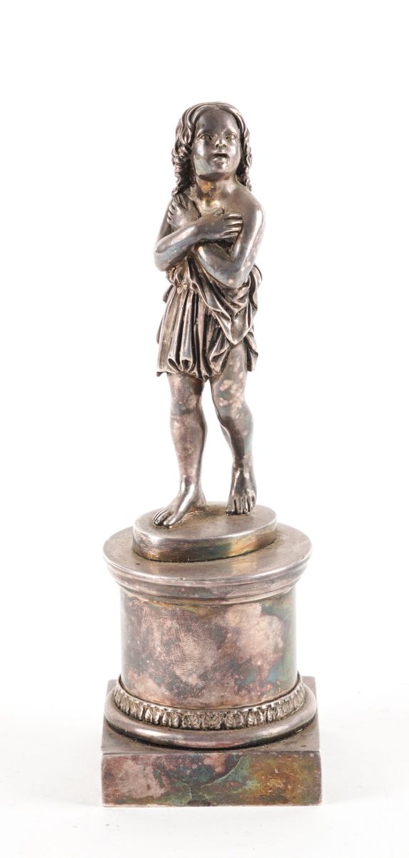 A SILVER PLATED FIGURE OF A GIRL