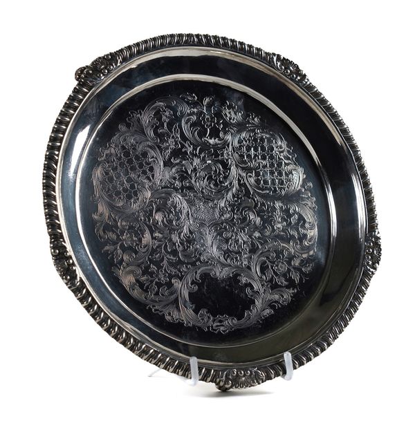 A GEORGE IV SILVER SHAPED CIRCULAR SALVER