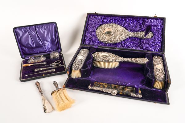 TWO LADY'S SILVER MOUNTED CASED DRESSING SETS AND TWO FURTHER ITEMS (4)