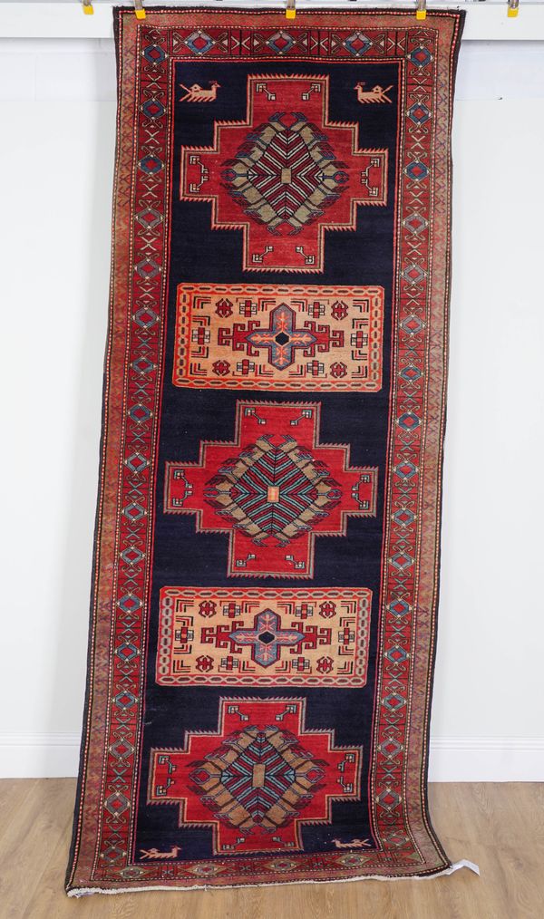 AN ERIVAN RUNNER, CAUCASIAN